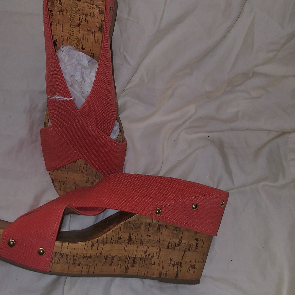 Ladies size 12 shoes actually a coral color